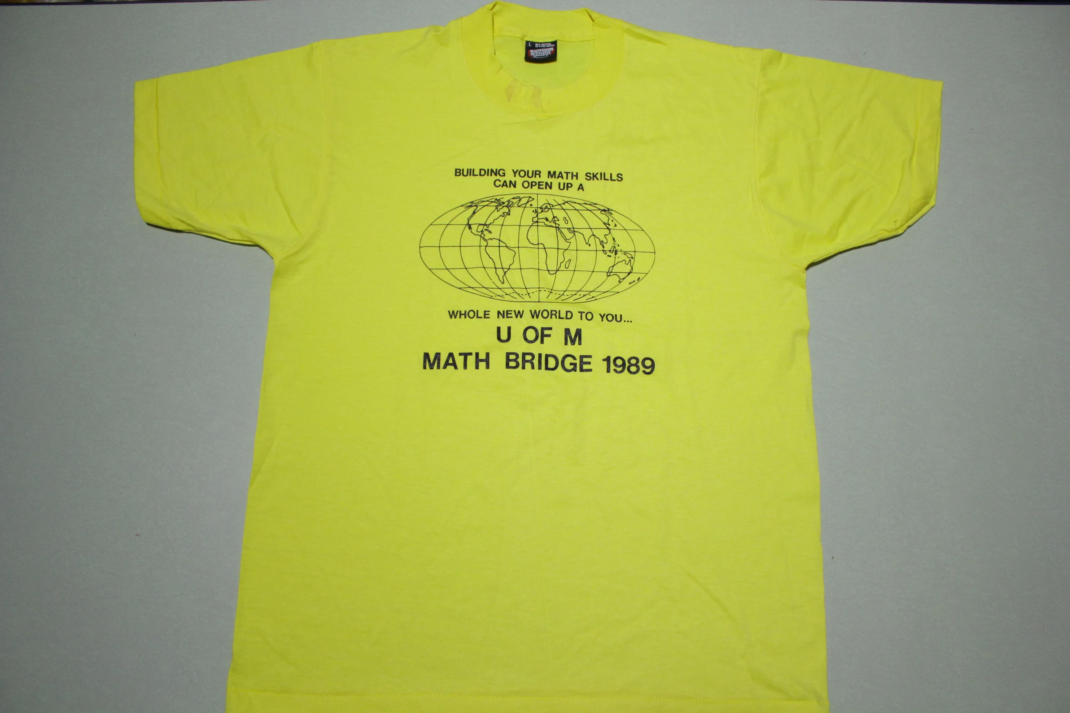 Vintage 1989 Math Bridge World Map Screen Stars Graphic T-Shirt for a Stylish Retro Look