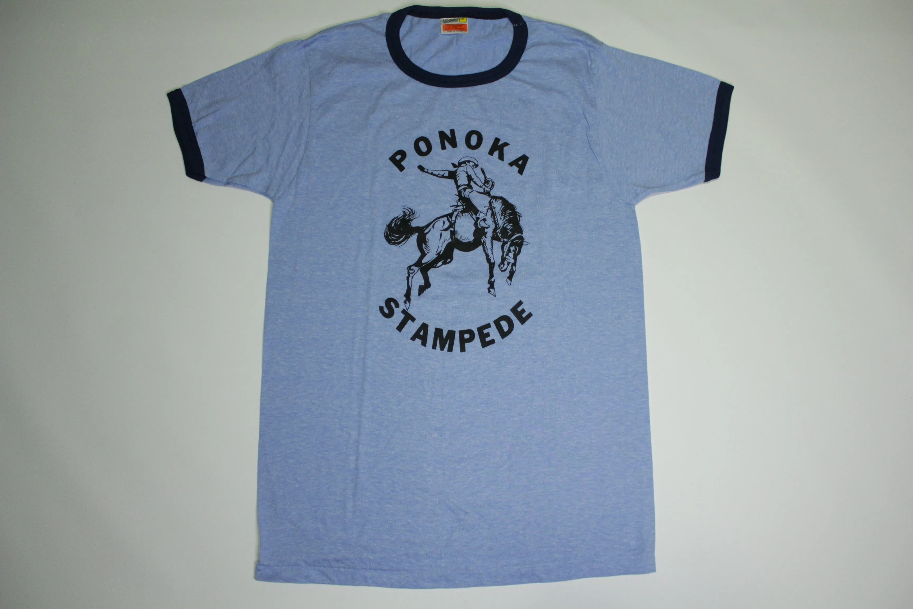 Sure! Here’s an optimized title for your e-commerce product:

Vintage 1980s Ponoka Stampede Ringer T-Shirt - Classic Harvey Woods Rodeo Tee from Alberta, Canada

This title includes key attributes like the vintage aspect, decade, event name, type of shirt, and geographical location, making it more appealing for search optimization.