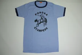 Sure! Here’s an optimized title for your e-commerce product:

Vintage 1980s Ponoka Stampede Ringer T-Shirt - Classic Harvey Woods Rodeo Tee from Alberta, Canada

This title includes key attributes like the vintage aspect, decade, event name, type of shirt, and geographical location, making it more appealing for search optimization.